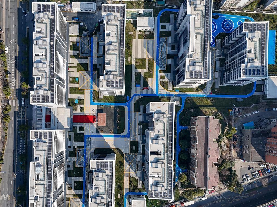 杭州首个“原拆原建”的自主更新小区浙工新村25日开启交付